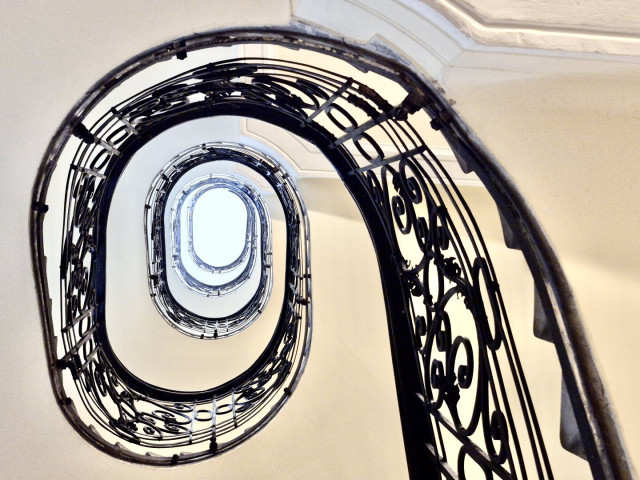 Staircase, seen from below, in an old building in josefstadt, vienna, austria