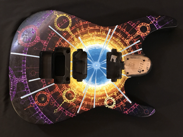 Front view Strat body with colorful art representing neutron star formation in a supernova with complex circular graphic overlays making it look like a sunburst finish