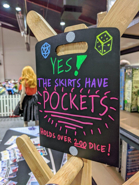 A display for a shop at a convention. Yes! The skirts have *POCKETS*, holds over 200 dice.