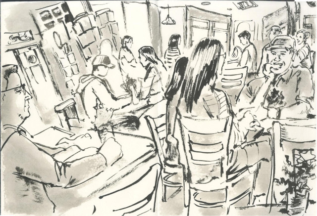 wide angle view in ink drawing of crowded cozy coffee shops and patrons. Man on right leans chin on heel of hand, pinky finger close to grinning mouth