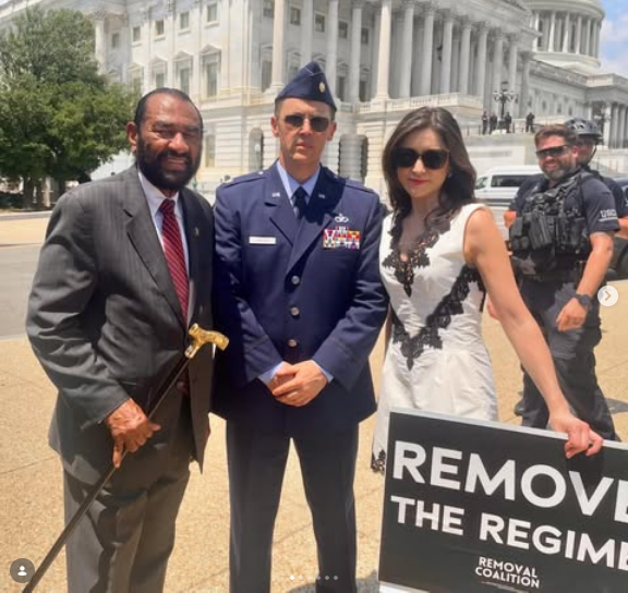 Congressman Al Green, Major Jason Paul Watson, and Removal Coalition founder Jessica Denson stand together outside the US Capitol with a sign that says "REMOVE THE REGIME." 