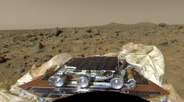 Photograph of NASA Pathfinder lander and the Sourjouner rover taken by the onboard camera from the surface of Mars 