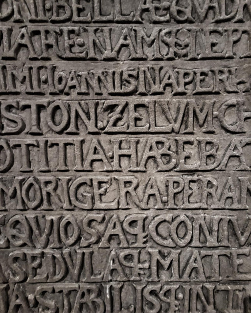 Stone lettering inside cathedral