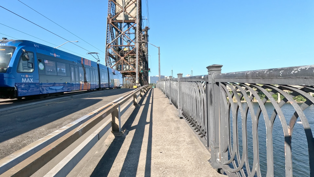 upper deck of the Steel Bridge alongside a MAX Blue Line light rail train that I would catch for my ride home moments later
frame from video by Ian Kluft
July 5, 2026
Portland, Oregon, USA