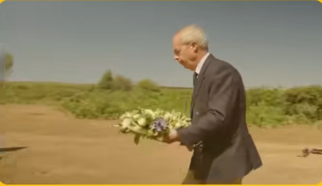 A dead man honouring a dead woman 