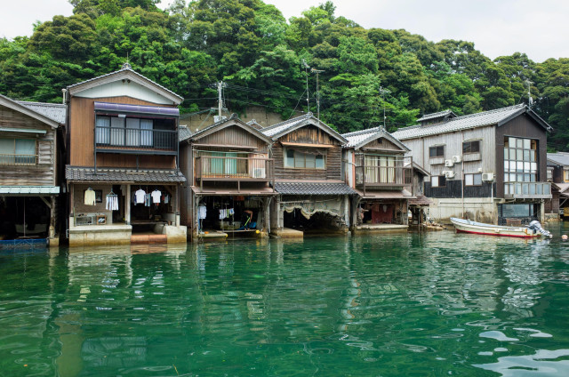 Ine, a fishing village on the coast of Kyoto Prefecture, famed for its 'boat houses' pressed close against the sea.