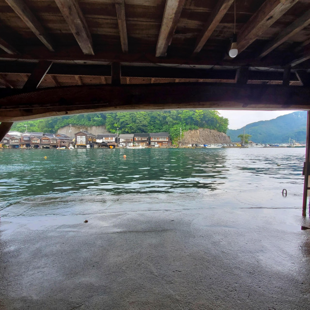 Ine, a fishing village on the coast of Kyoto Prefecture, famed for its 'boat houses' pressed close against the sea.