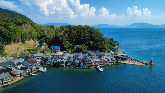 Ine, a fishing village on the coast of Kyoto Prefecture, famed for its 'boat houses' pressed close against the sea.