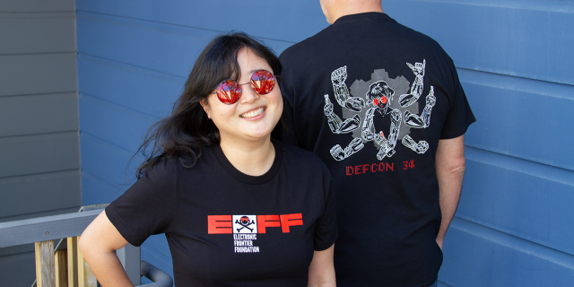 Two people wearing EFF's new DEF CON 34 t-shirt
