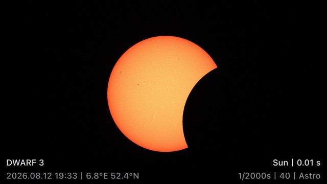 Partial solar eclipse with telescope info