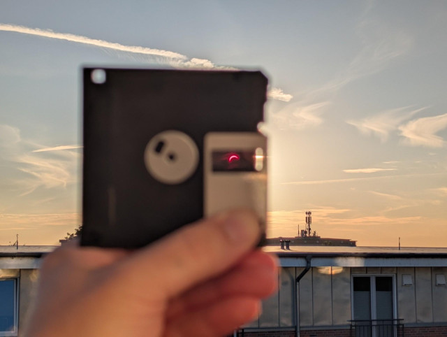Partial solar eclipse (80ish) viewed through a 3.5 floppy disk